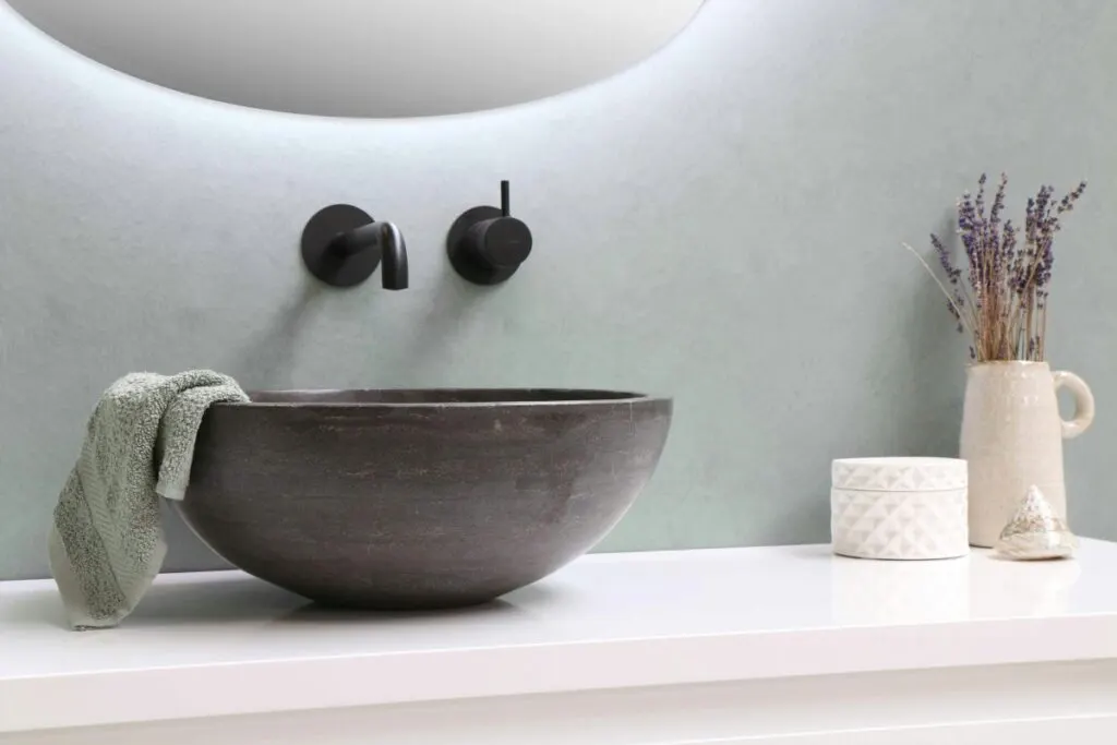 Modern bathroom basin with a wall-mounted tap