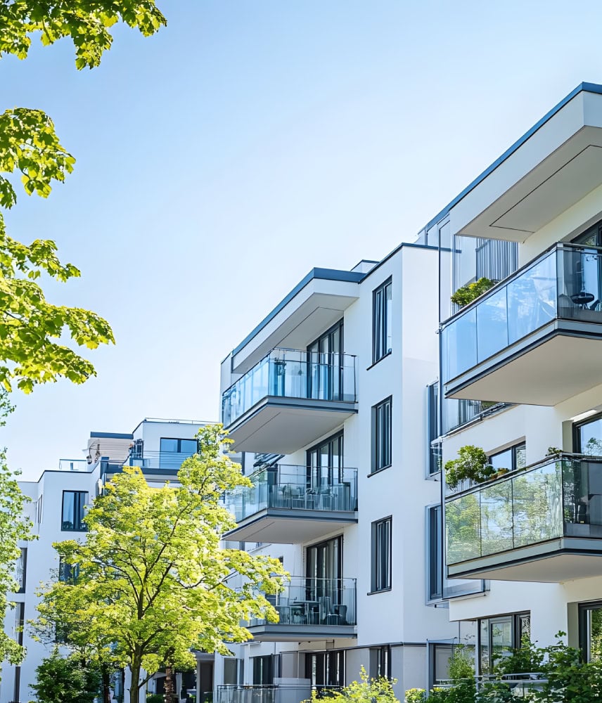 Modern residential apartments balcony and green spaces